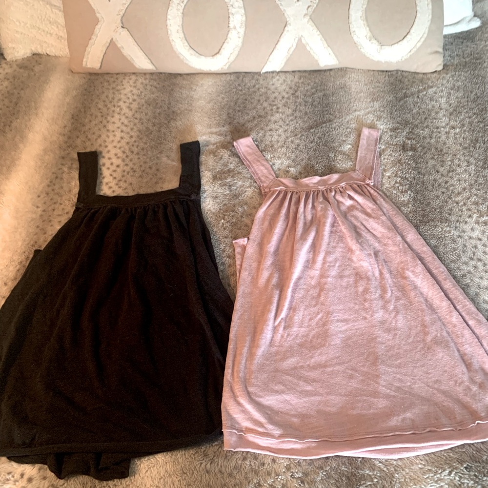 Free People 2 flowing cotton tanks.  Great condition , no rips or stains.